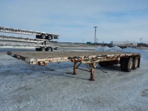 Doepker-Tandem-Flat-Deck-Trailer